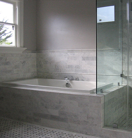 Tub & shower in white marble
