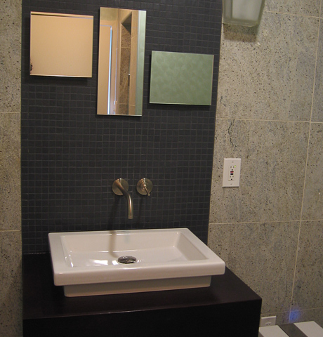 Wall mount Duravit sink with hansgrohe faucet