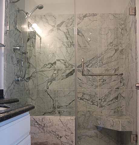 marble shower with bench